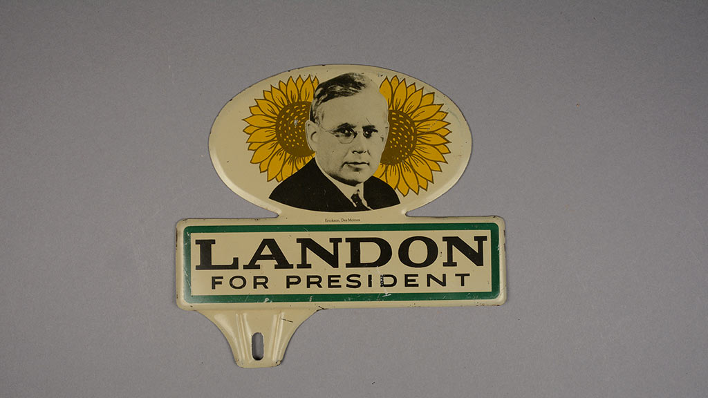 A license plate attachment with the words 'Landon For President' and an image of Alf Landon
