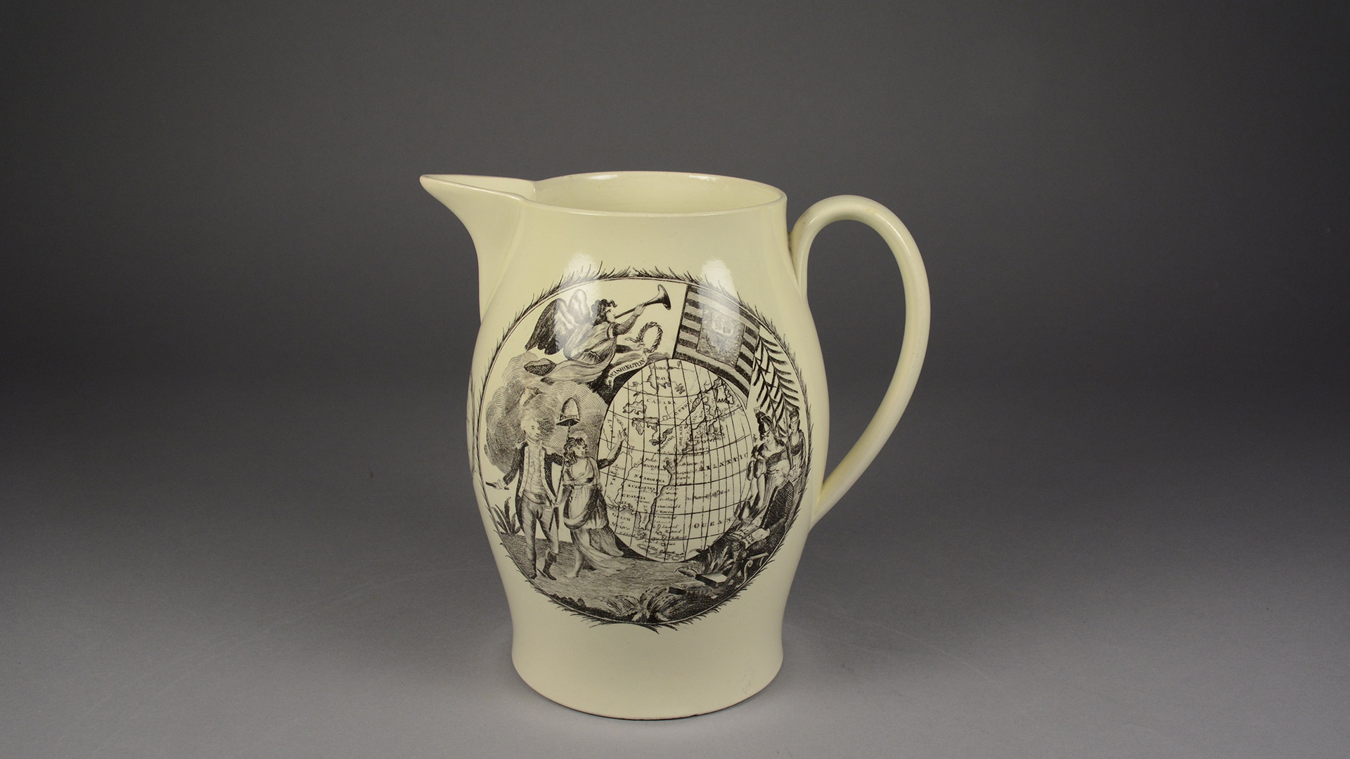 A beige ceramic pitcher with an images of George Washington, Ben Franklin, and figures representing liberty, wisdom, and justice